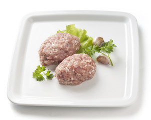 Raw chicken rissoles