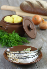 Anchovies and boiled potatoes.