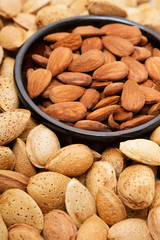 Almonds in a bowl, snacks of nuts