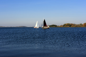 Yacht sailing on lake