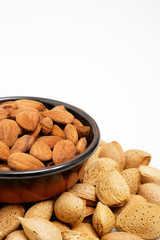 Almonds in a bowl, snacks of nuts