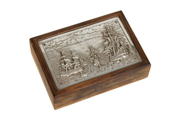 Silver engraving on a old wooden box, isolated