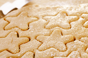 gingerbread  star cookie cuts dough