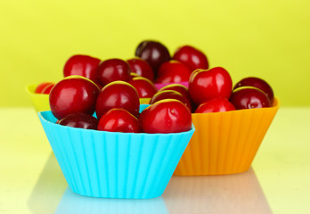 cherry in silicone molds on colorful background