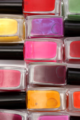 Group of bright nail polishes, close up