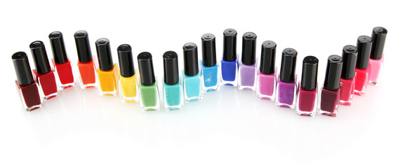 Group of bright nail polishes isolated on white