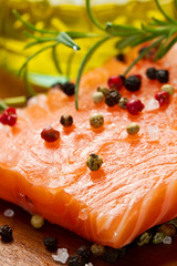 Fresh salmon fillet on wooden board