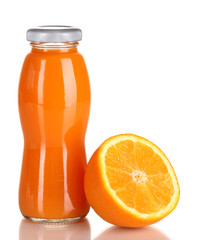 Delicious orange juice in a bottle and orange next to it
