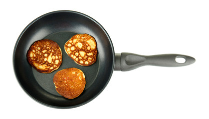 delicious sweet pancakes in frying pan isolated on white
