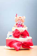 Cakes made of diapers on white