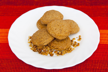 Nut cookies on white plate