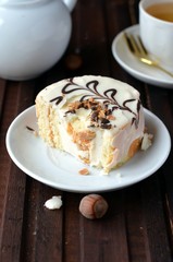 Biscuit roll with cream and chocolate in the context of