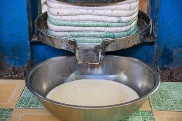 pressing coconut