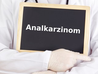 Doctor shows information on blackboard: anal cancer