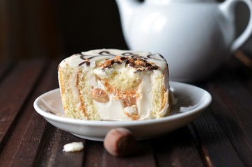 Biscuit roll with cream and chocolate in the context of