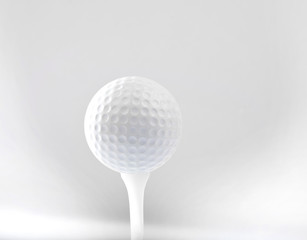 golf ball on tee and grey space background