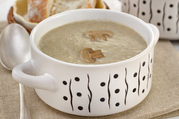 soup with champignon  in the bowl
