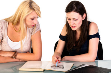 Two beautiful student girls getting ready for school