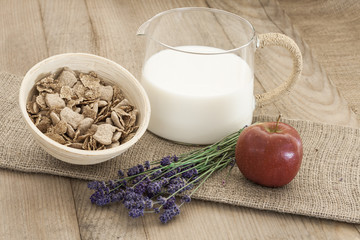 Morning bowl of milk and whole grain flakes