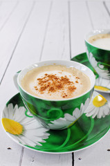 Cappuccino in green cup