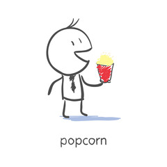 Businessman eating popcorn