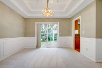 Empty luxury home interior of dining and living room.