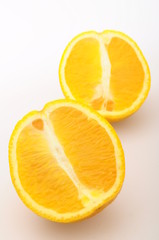 Half orange fruit on white background