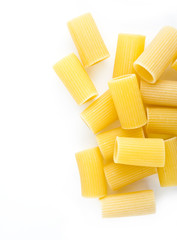 Rigatoni raw pasta isolated on white