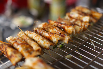Rice flour wraps, grilling at the food stall in Asia