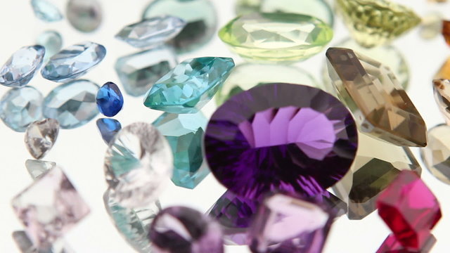 Gemstones on mirror turning slowly