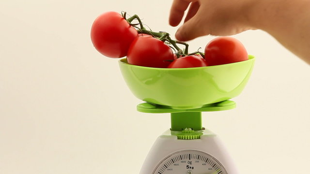 Kitchen Scale weighing tomatoes
