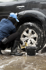 A man washing the car