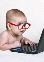 Funny kid with a laptop