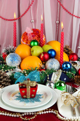 Serving Christmas table on white fabric background