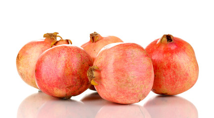Ripe pomegranates isolated on white
