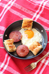 Gourmet breakfast sunny-side up egg and ham with turkish bread
