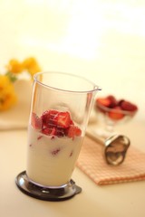 Strawberry and milk in multi blender