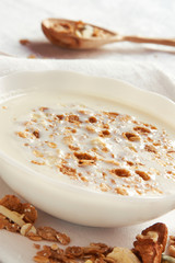 healthy breakfast of muesli and glass of milk