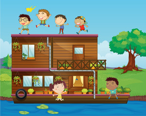 kids playing near a houseboat