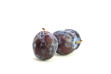 Fresh plums isolated on the white background