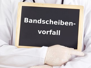 Doctor shows information: spinal disc herniation