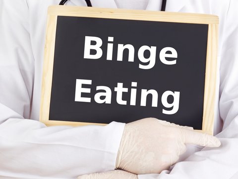 Doctor shows information: binge eating