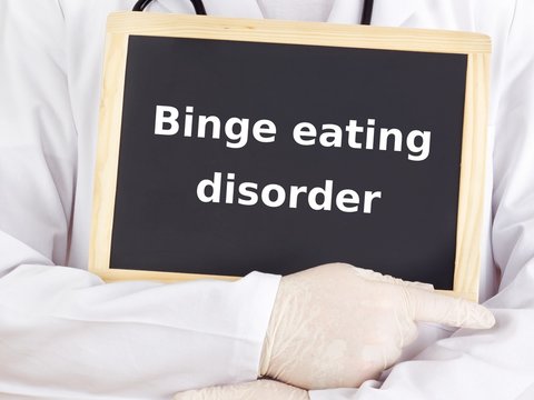 Doctor shows information: binge eating disorder