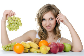 Beautiful girl with fruit and vegetables