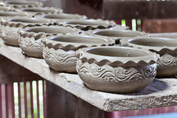 large group of clay pots spread