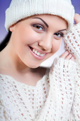 attractive young caucasian woman in warm clothing.