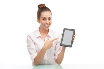 Young woman holding digital tablet
