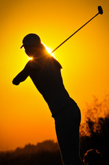 beauty  girl play golf on the sunset