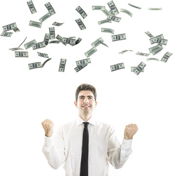 Young businessman with a money rain isolated on white background