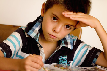 tired student making homeworks